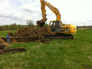 Land excavation with construction machine