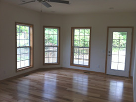 wood floor with large window photo